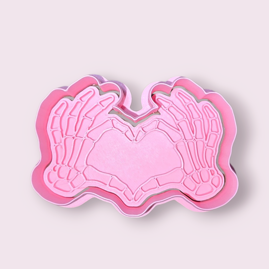 ESQUELETO #2 MANO EN FORMA DE CORAZÓN