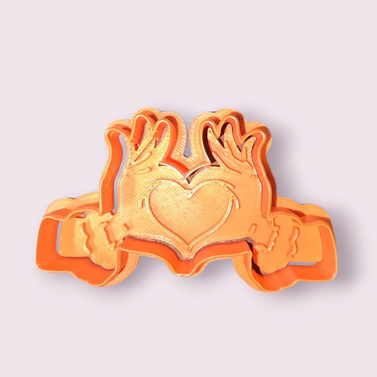 GRINCH #6 MANO CON FORMA DE CORAZÓN